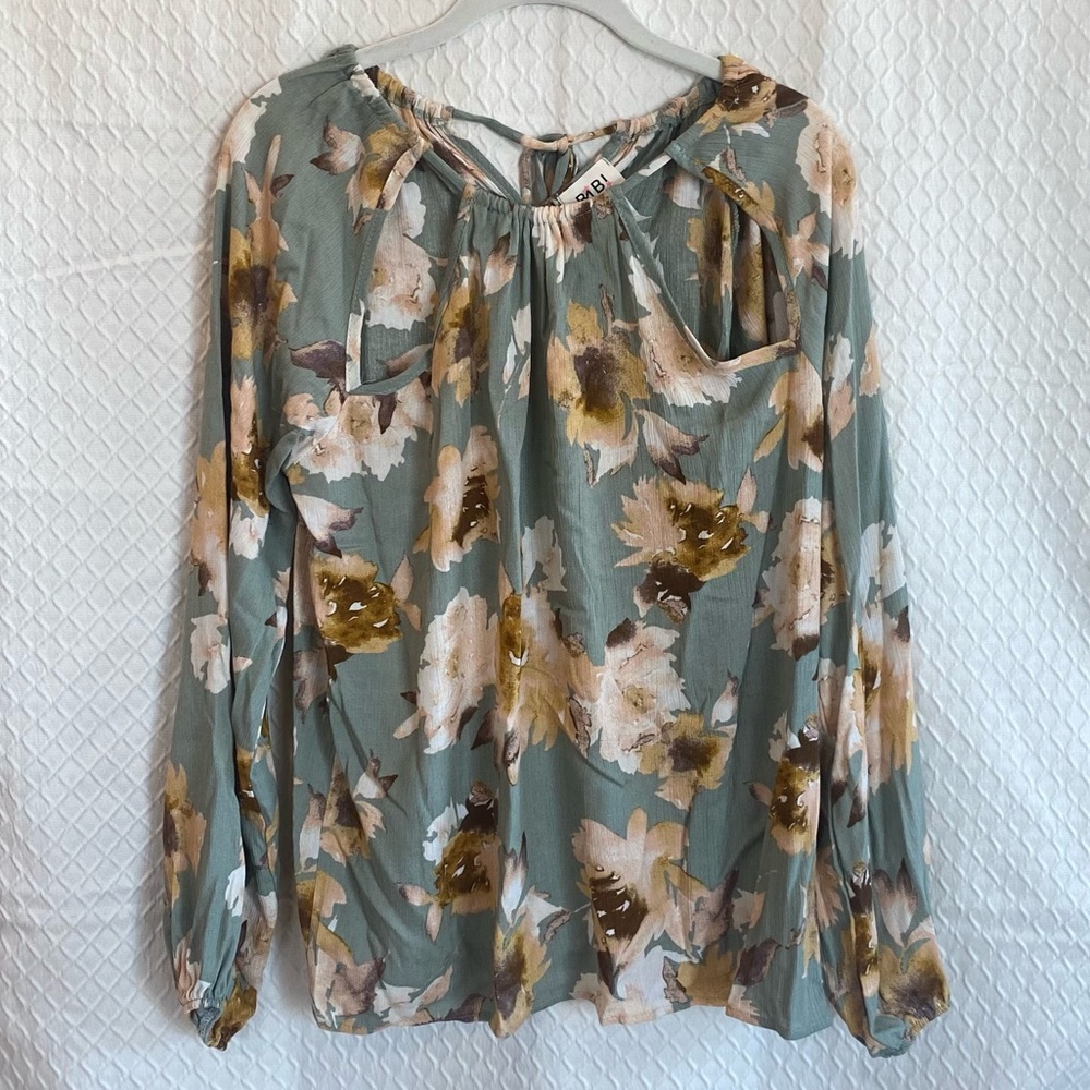 BiBi floral long sleeve top. Tie back. Teal/yellow/brown. Small. NWT.